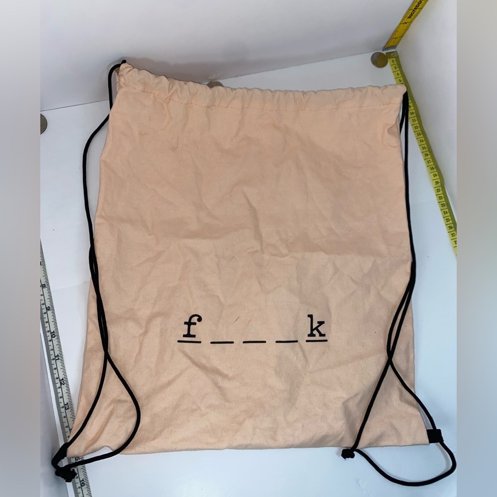 F word Peach Drawstring Backpack with Black Lettering
